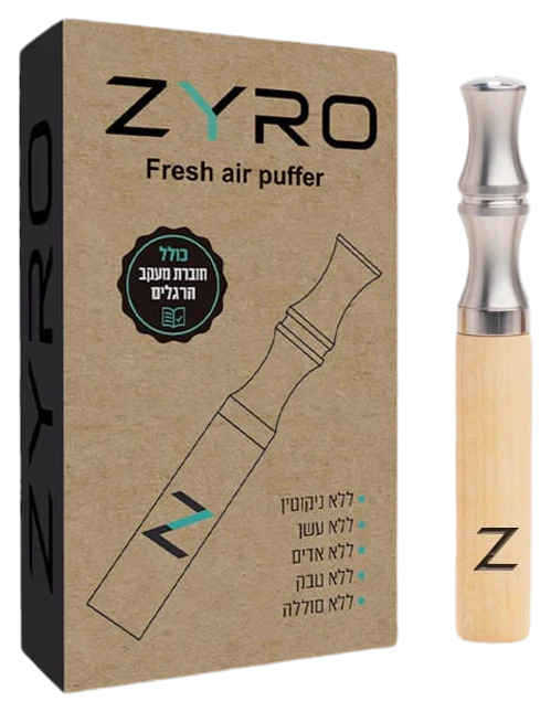 מכשיר ZYRO מעץ ומתכת לצד אריזת הקרטון